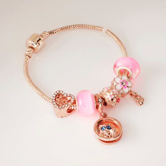Pulsera Rosa con Charms Buho - Acero