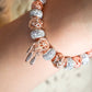 Pulsera Tono Oro Rosa con Charms y Zircones - Acero