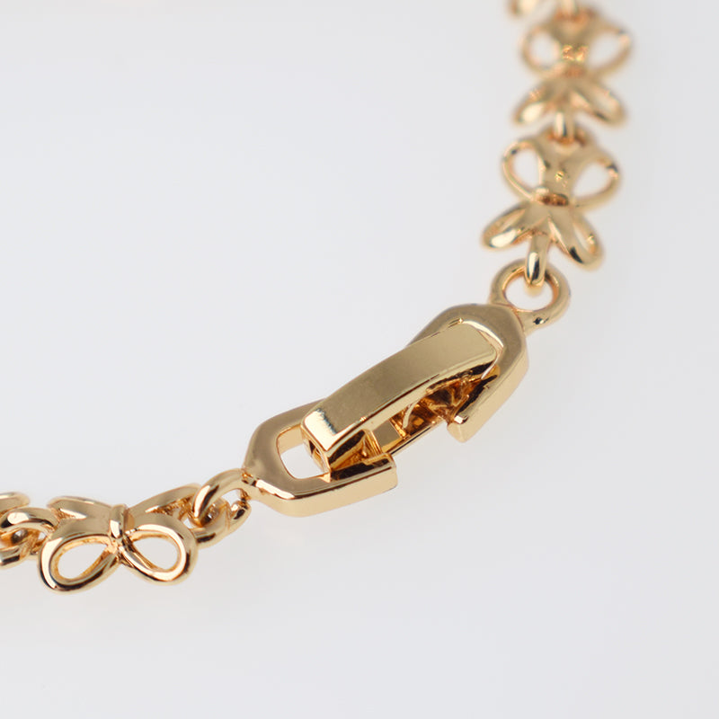 Pulsera Moñito con Cristales  Blancos y Rojos - Baño 18K