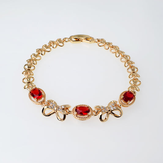 Pulsera Moñito con Cristales  Blancos y Rojos - Baño 18K