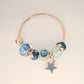 Pulsera con Charms Estrella Azul - Acero