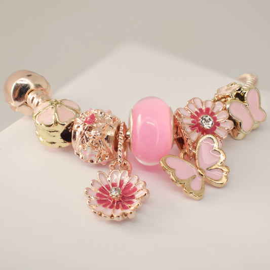 Pulsera Rosa con Charms flor de loto y mariposa  - Acero